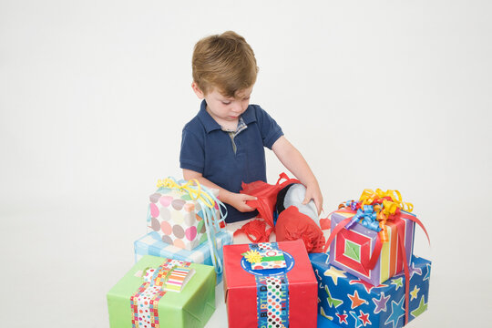 Young Boy opening Birthday Presents