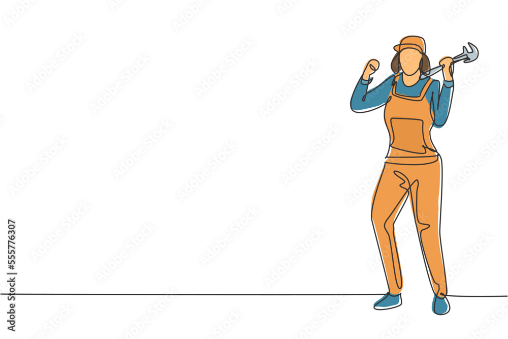 Wall mural Single one line drawing female plumber stands with celebrate gesture and holding carpentry tool fixing broken plumbing at home. Successful job. Continuous line draw design graphic vector illustration