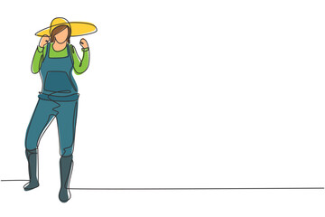 Continuous one line drawing female farmer stood with celebrate gesture, wearing straw hat and farm uniform to plant crops on farmland. Success work. Single line draw design vector graphic illustration