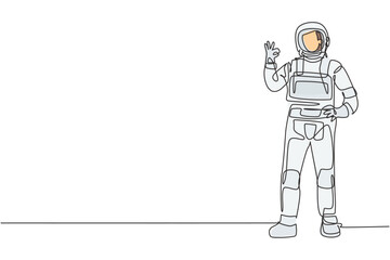 Single continuous line drawing astronaut stands with gesture okay wearing space suit exploring earth, moon, other planets in the universe. Dynamic one line draw graphic design vector illustration