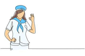 Single one line drawing sailor woman with gesture okay and scarf around his neck ready sail across seas in a ship headed by captain. Modern continuous line draw design graphic vector illustration