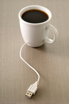 USB Plugged into Coffee Cup