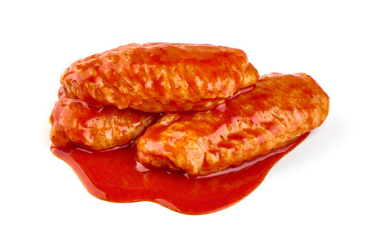 Buffalo Chicken Wings In Red Sauce, Isolated On White Background.