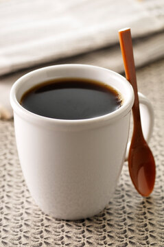 Close-up of Cup of Black Coffee with Spoon