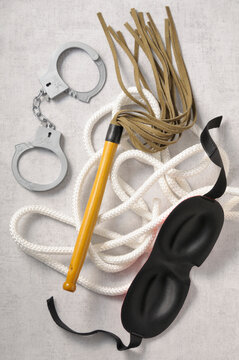 Overhead View of Mask, Handcuffs, Whip and Rope, Studio Shot