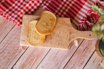 Top view of slices of bread on the cutting board preparing for breakfast