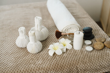 Obraz na płótnie Canvas Spa accessories with herbal compressing ball in spa room.