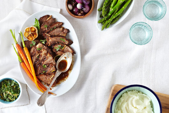 Beef Brisket with Herbs, Asparagus, Mashed Potatoes and Pearl Onions