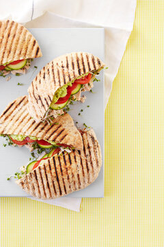 Overhead View of Tuna, Avocado, Tomato and Sprout Pita Pocket Sandwiches, Studio Shot