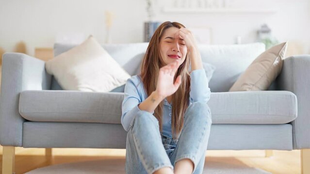 Young asian woman upset , sadness and frustrated by problem with work or relationships. Feeling despair and anxiety, loneliness, having psychological trouble