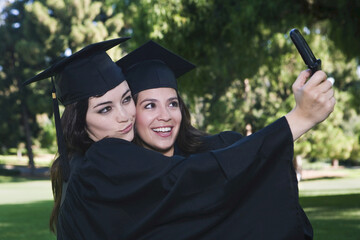 Graduates Taking Self Portrait with Camera Phone