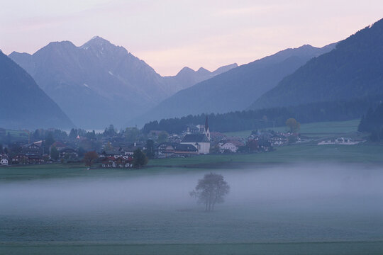 Fog over Field at Dawn, Dolomites, Italy