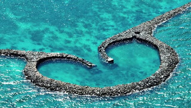 Aerial view of stone tidal weirs in Penghu, Taiwan.