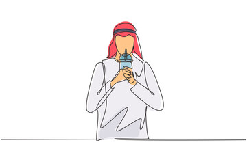 Single continuous line drawing young Arabian male hold plastic cup and drink iced green tea with straw. Make him refreshing in summer season. Dynamic one line draw graphic design vector illustration