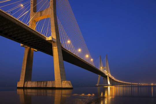 Ponte Vasco da Gama Illuminated at Night across Tagus River, Lisbon, Portugal