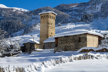Traditional Svan towers and houses surrounded by the high mountains of the Caucasus, Svaneti, Georgia