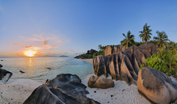 Rock Formations and Palm Trees at Sunset, Anse Source d&acute;Argent, La Digue, Seychelles
