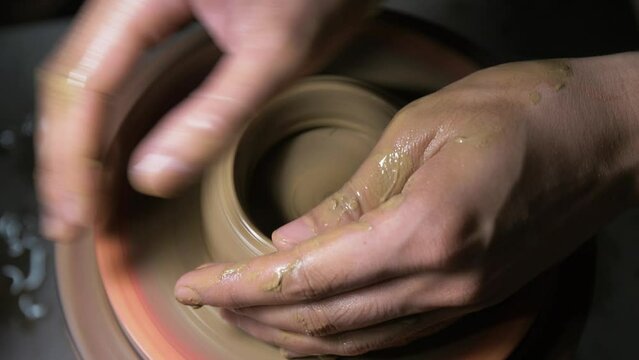 close up top detail view of The process of making ceramic teapots, making mud by hand