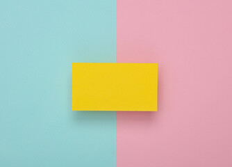 Fototapeta na wymiar Yelow Blank business card for corporate identity on pink blue background. Creative mockup.
