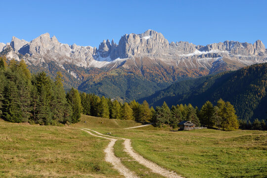 Track leading towards to Rosengarten (Catinaccio) mountains near the village Tiers, Wuhnleger Area, Tiers, Tierser Tal, Valle di Tiers, Bolzano district, Bozen Province, South Tyrol, Trentino-Alto Adi