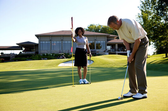 Couple Golfing, Burlington, Ontario, Canada