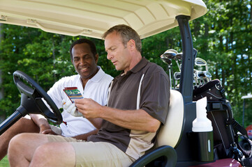 Golfers in Golf Cart with Scorecard, Burlington, Ontario, Canada