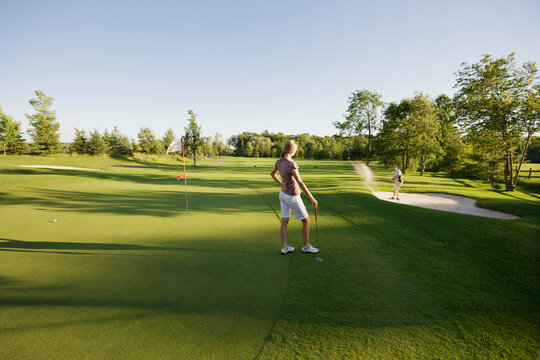 Couple Golfing, Burlington, Ontario, Canada