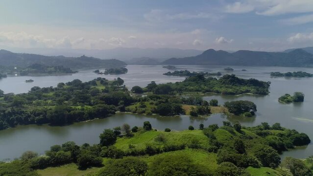 Aerial view of the Suchitl&aacute;n lake reservoir in Chalatenango, El Salvador - Pan right