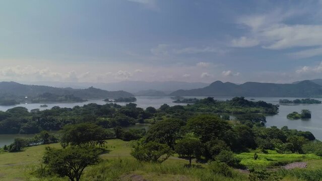 Aerial view of the Suchitl&aacute;n lake reservoir in Chalatenango, El Salvador - Dolly in