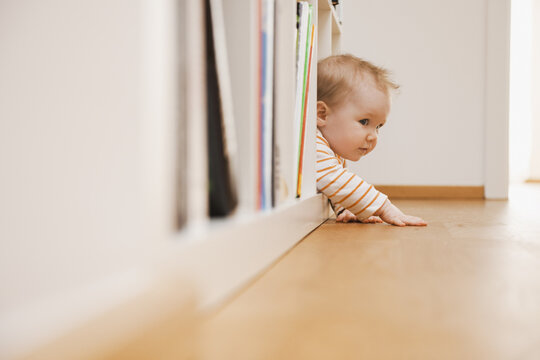 Baby in Bookshelf