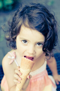 Girl Eating Ice Cream Cone