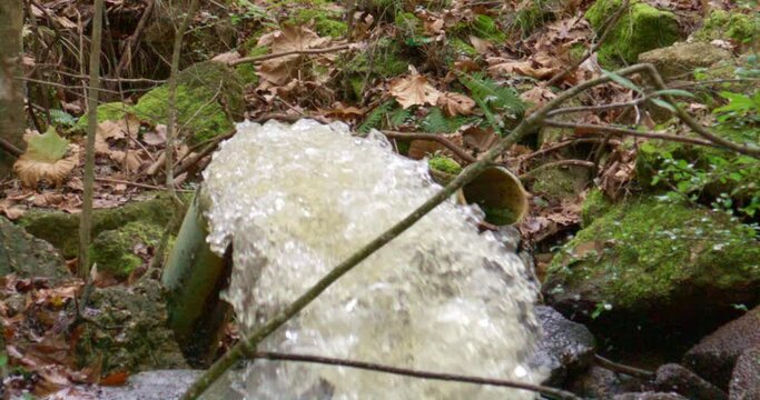 Water coming out of pipe in Slow motion