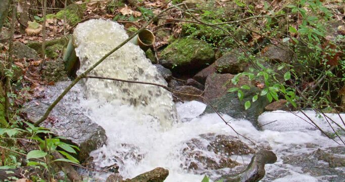 Water coming out of pipe Slow motion