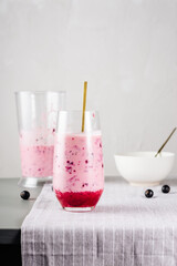 Blackcurrant smoothie with natural yogurt.