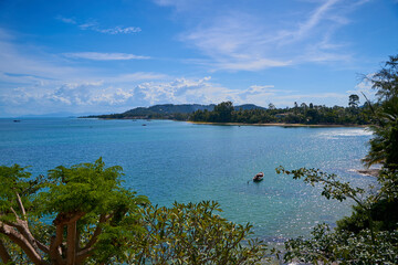 A bay with turquoise sea water on the Thai island of Samui