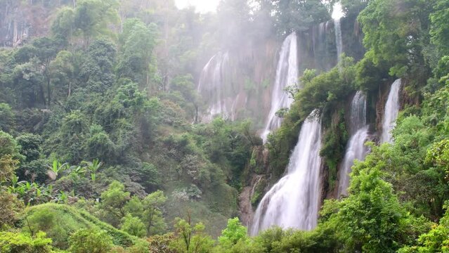 Thi Lor Su waterfall is located in the Umphang Wildlife Sanctuary in Tak province, Thailand, a UNESCO World Heritage site.