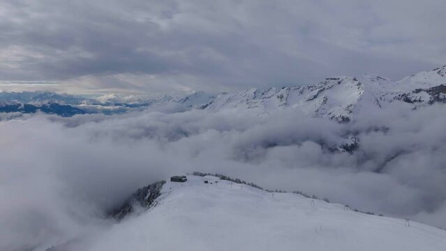Aerial shot in Switzerland over the town of Crans Montana, Valais