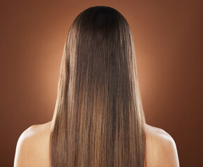 Woman, back or hair style on brown background in relax studio for keratin treatment, self care...