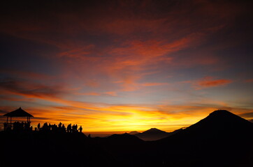 the shades of the rising sun are so extraordinary the sky is like a stretch of golden light