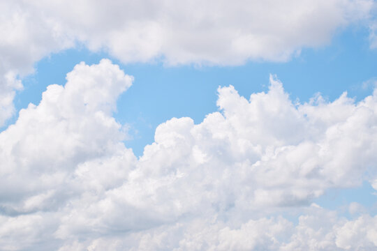 white clouds on a fresh blue sky with various shapes for anime or aesthetic backgrounds