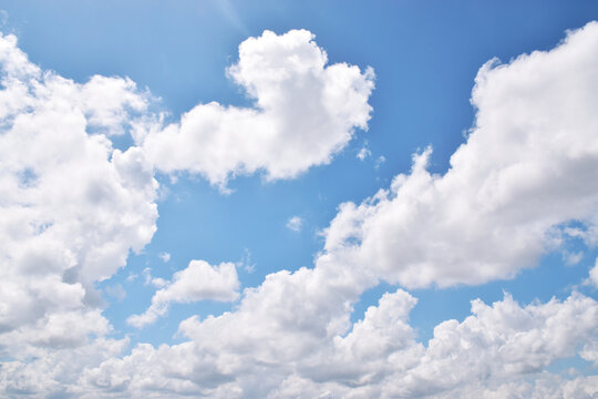 white clouds on a fresh blue sky with various shapes for anime or aesthetic backgrounds