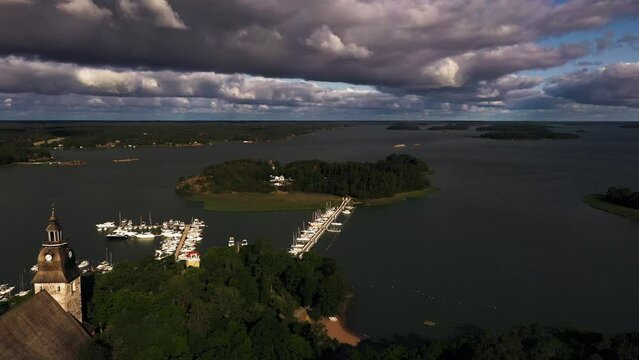 Aerial view of the Moomin island in Naantali, Finland - ascending, drone shot