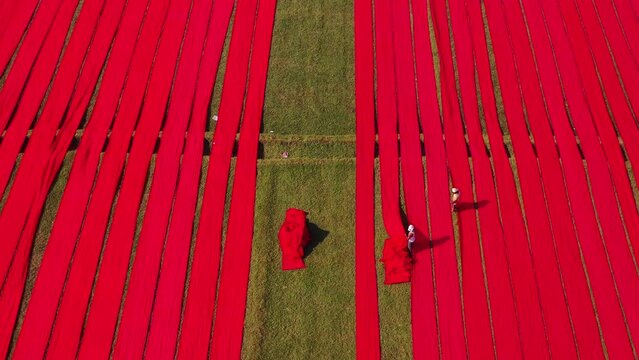 Aerial View Of People Working In A Field In Narsingdi, Dhaka, Bangladesh.