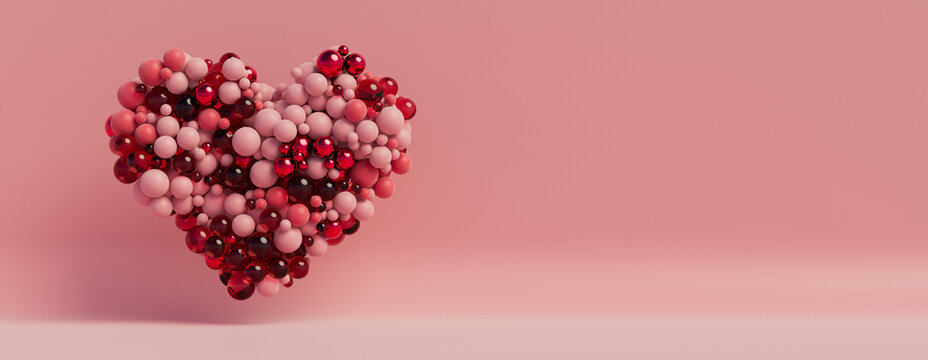 Multicolored Sphere Love Heart. Pink, Red Glass and Red Metallic Spheres arranged in a heart shape. 3D Render with copy-space. 
