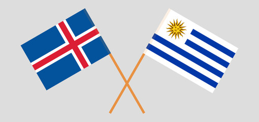 Crossed flags of Iceland and Uruguay. Official colors. Correct proportion