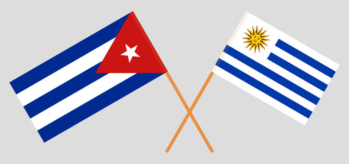 Crossed flags of Cuba and Uruguay. Official colors. Correct proportion
