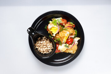 Yum Kai Dao is Thailand Crispy Fried Egg Salad.