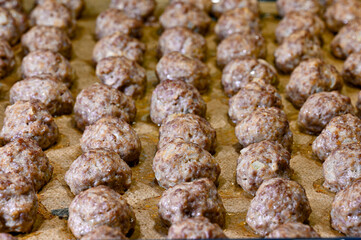 lots of meat balls cooked in owen