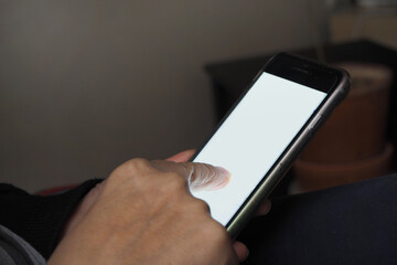 Elderly hand holding phone mobile blank screen and finger touch. 