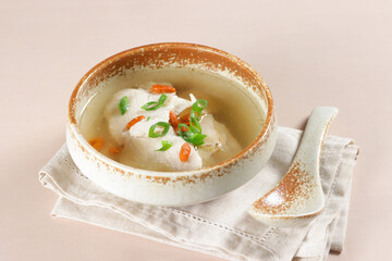 Sup Ikan Goji Berry is Fish Soup with Goji Berry served in a bowl.